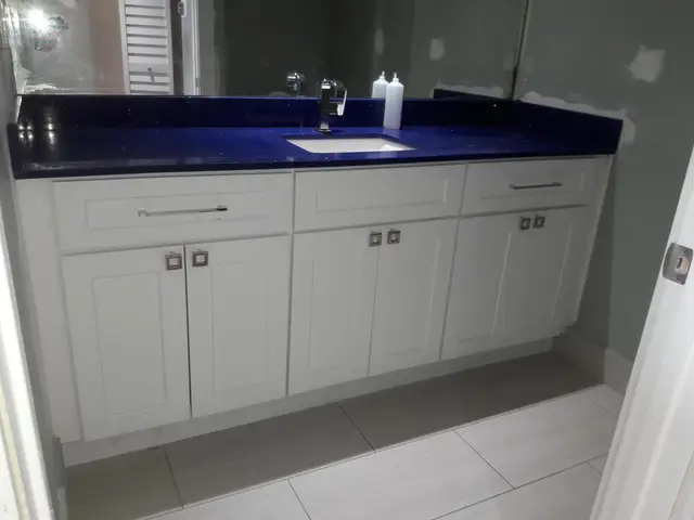 White kitchen remodel with marble backsplash